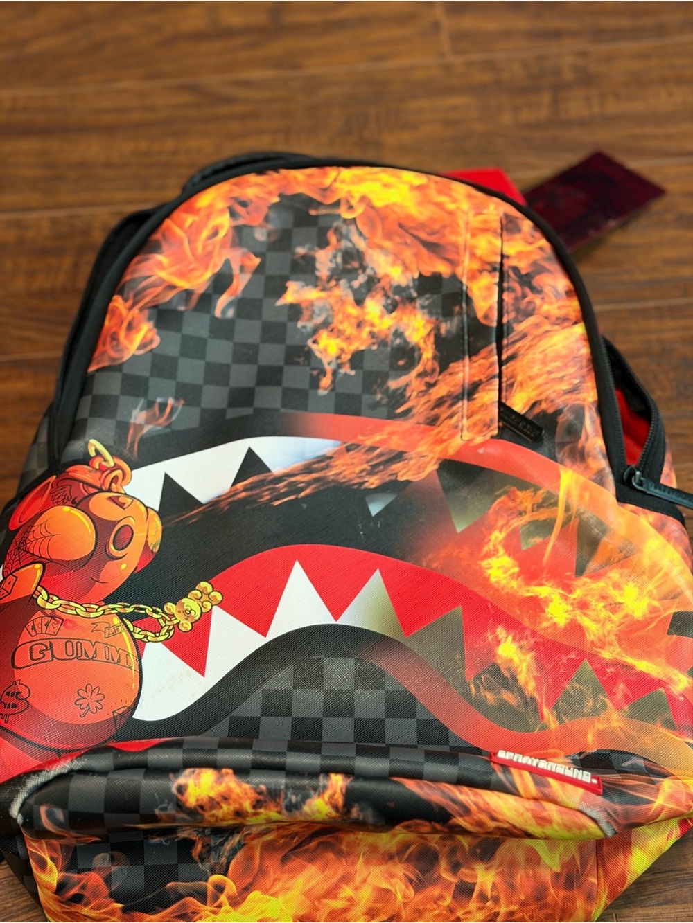 Sprayground Black and Red Flame Shark Backpack